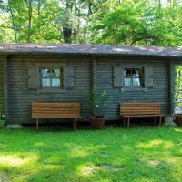 Holzhütte als Gartenhaus