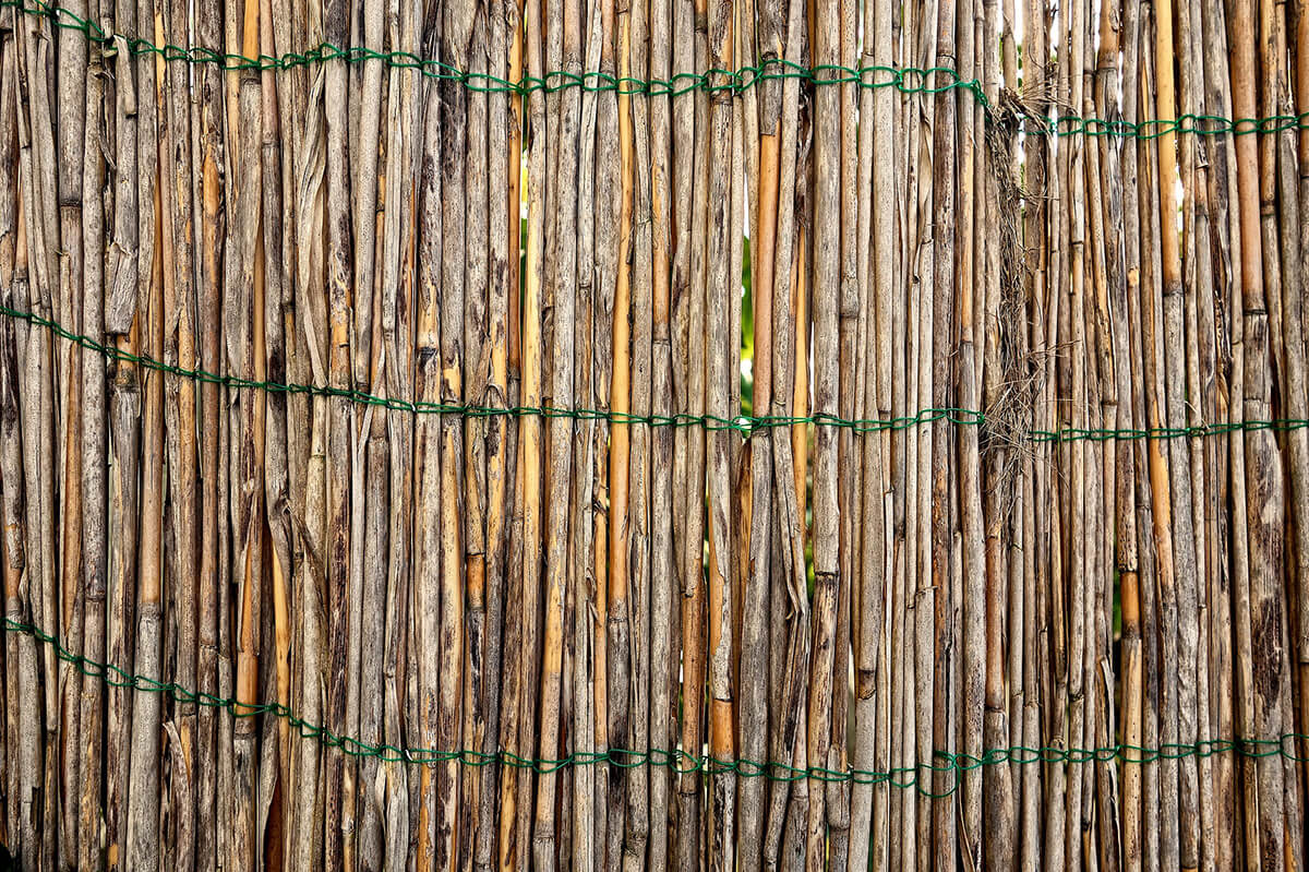 Bambusmatte als Gartenzaun