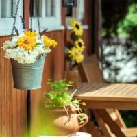 Veranda  geschmückt mit Blumen