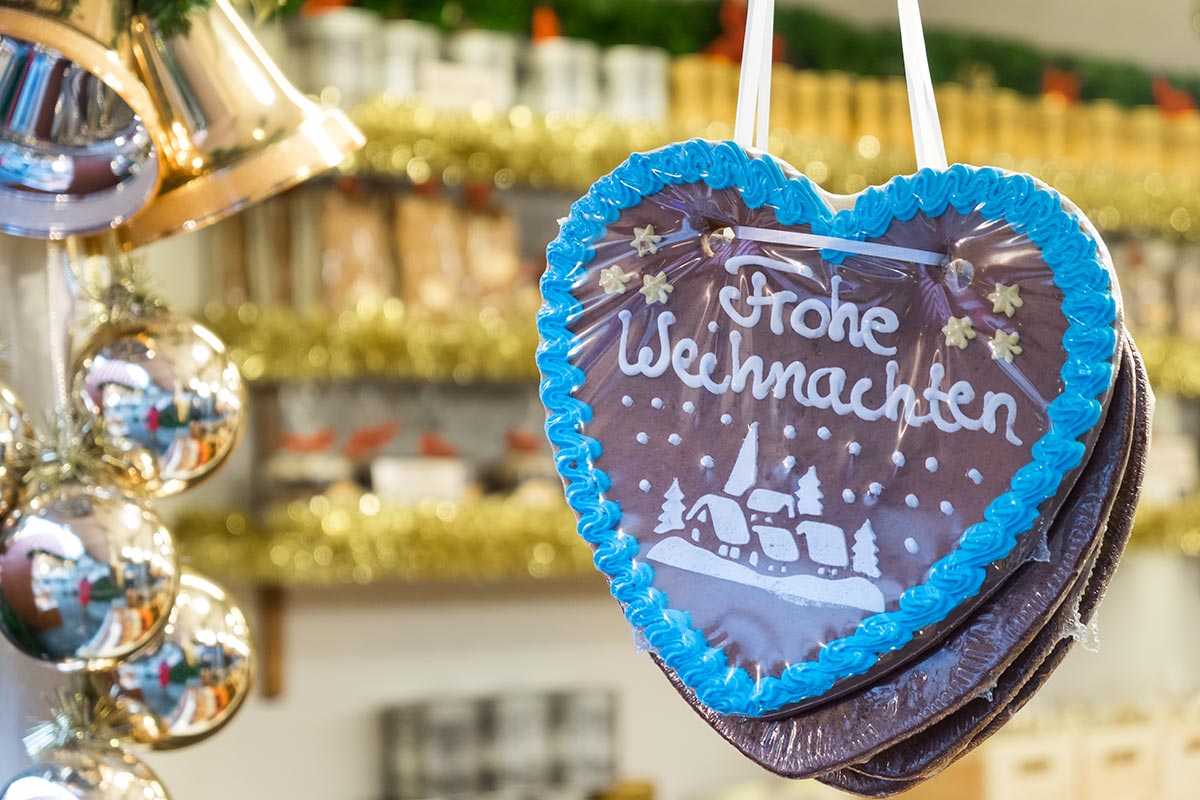 Lebkuchenherz mit Weihnachtsgruß "Frohe Weihnachten"