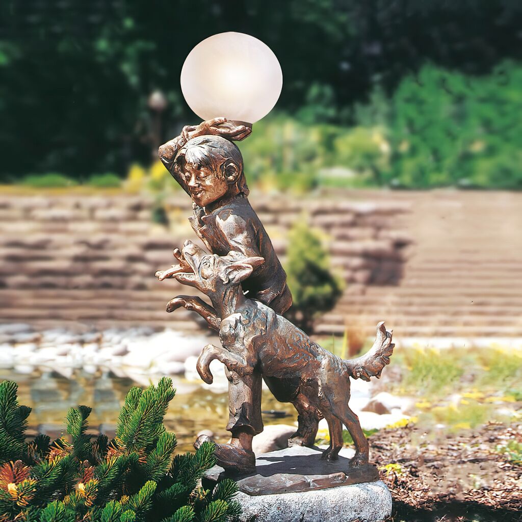 Image of Limitierte Bronzefigur mit Glaskugel - verspielt - Junge mit Hund & Lampe