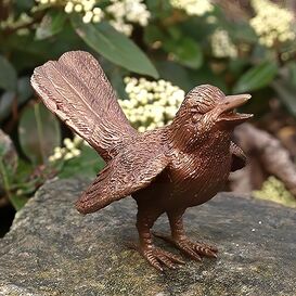 Neugierige Bronze Vogelskulptur zwitschert - Tracko